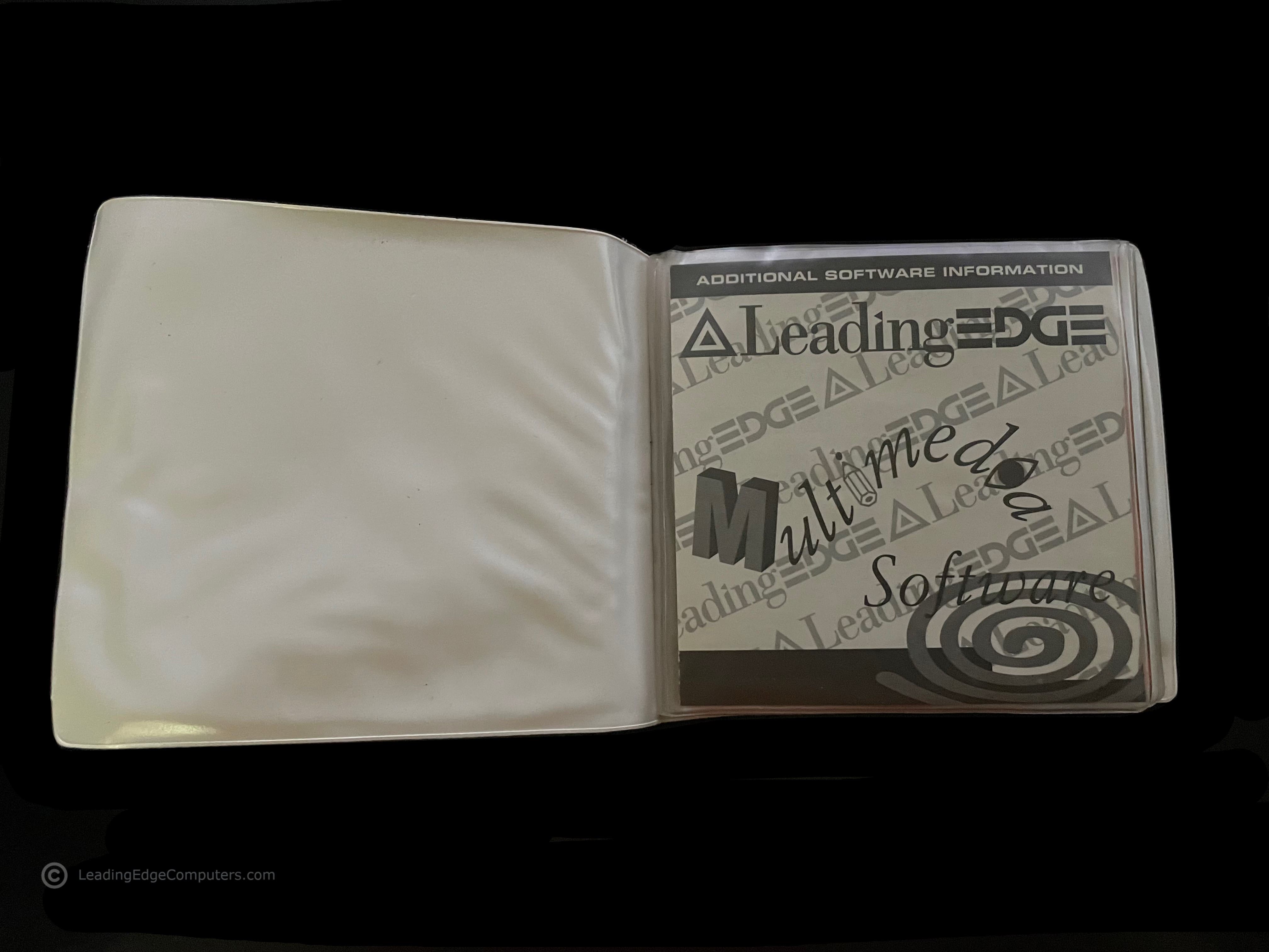 Multimedia Software pack opened up to the first disc, showing the additional software information sleeve